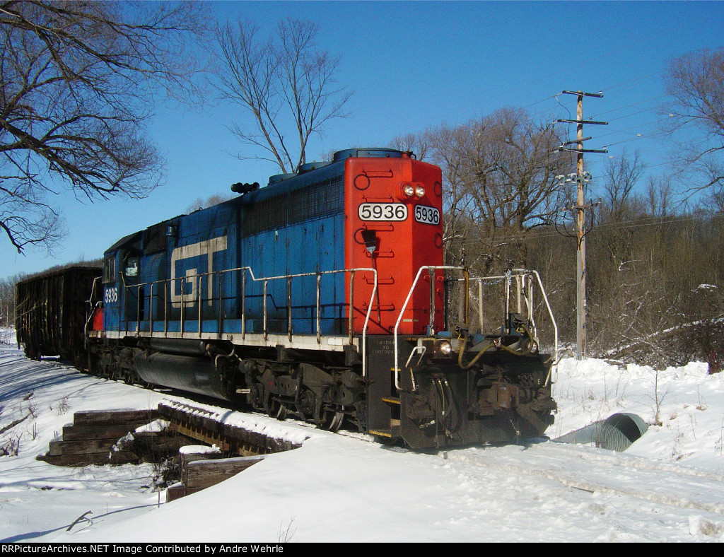 GTW 5936 crosses a small bridge approaching Highland Rd.